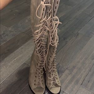 Knee high tie up boots